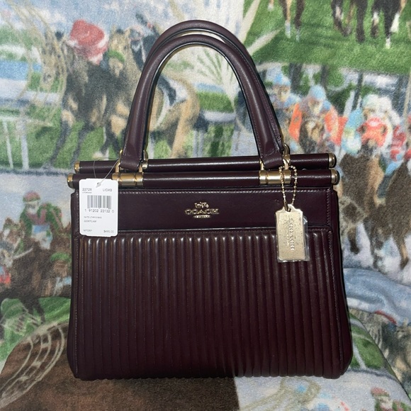 Coach Handbags - $25 ENTRY Nov GIVEAWAY Coach leather quilted oxblood  crossbody Entry only